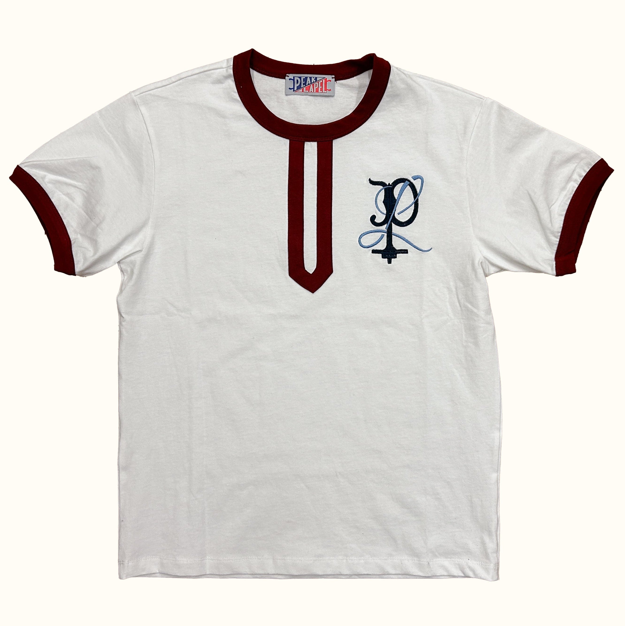 White ringer shirt with red trim featuring a logo on a white background